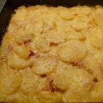 Potatoes with onions with mayonnaise in the oven